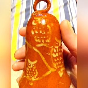 Drip glazed four inch owl bell. Brown.